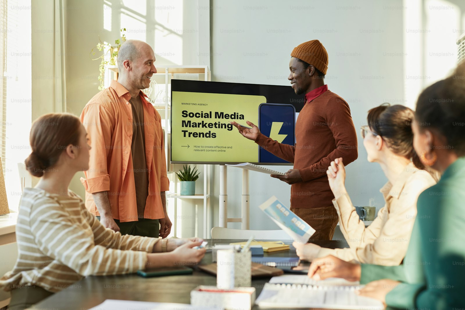 People discussing a social media presentation